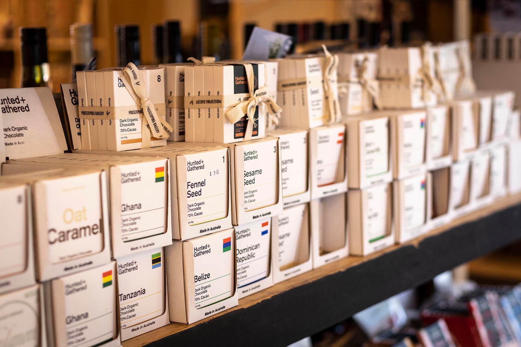 A wall of gourmet chocolates from 'Hunted & Gathered' on display at Proserpina